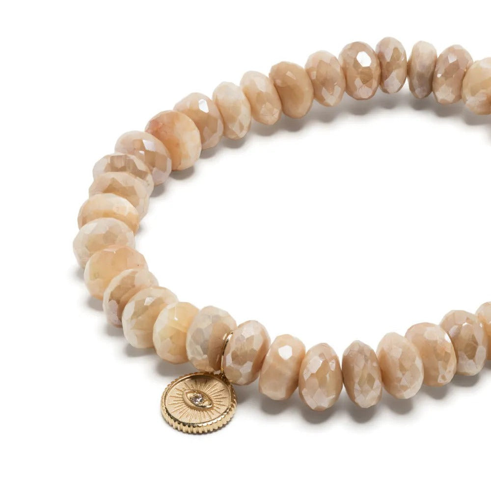 Beaded bracelet with round coin charm