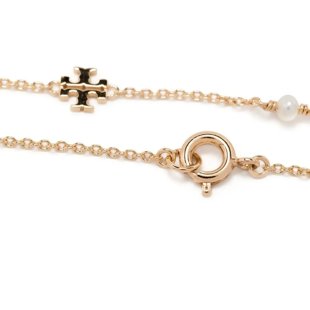 Gold tone station necklace
